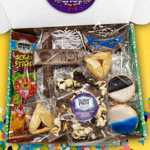 Happy Purim Box with kosher snacks, chocolates, cookies, and hamentashen for festive celebrations.