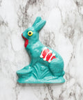 Handcrafted white chocolate zombie bunny with eerie details, perfect Halloween treat for spooky celebrations and parties.