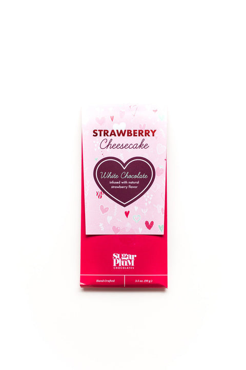 Strawberry Cheesecake White Chocolate Bar packaging with heart design, by Sugar Plum, perfect gourmet dessert candy for gifting.