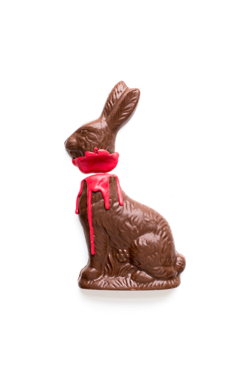 Handmade Milk Chocolate Victim Bunny with a headless design and red details, perfect for Halloween treats, 7.5 oz gourmet chocolate.