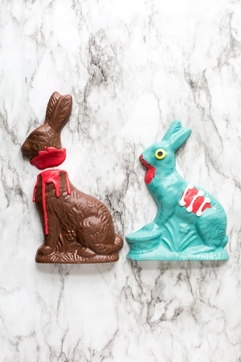 Limited Edition Chocolate Zombie Bunny and Victim Set for Halloween or Easter on marble background.