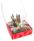 Chocolate Pretzel Passion Gift Box with 22 gourmet pretzels dipped in milk, dark, and white chocolate, in red festive packaging.