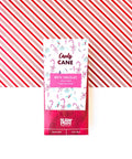 Candy Cane White Chocolate Bar packaging with festive peppermint design, set against red and white striped background.