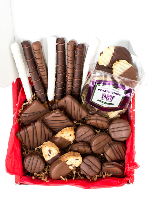 Gourmet chocolate gift box with 26 hand-dipped treats, including chocolate-covered potato chips, cookies, pretzels, and more.