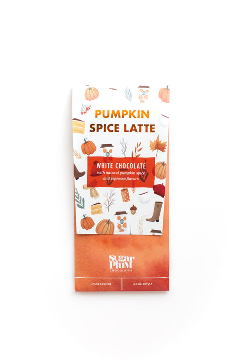 Pumpkin Spice Latte White Chocolate Bar with autumn-themed packaging featuring pumpkins and fall leaves.