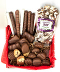 Chocolate Eruption Gourmet Gift Box with 26 hand-dipped treats including chocolate-covered popcorn, cookies, pretzels, and more.