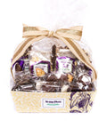 Luxurious Sugar Plum Kilimanjaro 40-piece gourmet chocolate gift basket with decorative bow, perfect for special occasions.