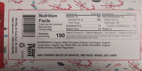 Nutrition facts label of Candy Cane White Chocolate Bar showing ingredients and allergens on a holiday-themed background.