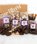Double Decadence Dark Chocolate Gift Box with 42 gourmet snacks including popcorn, pretzels, and potato chips, perfect for gifting.