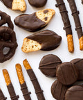Gourmet dark chocolate-covered snacks assortment from Sugar Plum's Double Decadence Gift Box, perfect for gifting and special occasions.