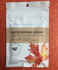 Maple Brown Sugar Vegetable Seasoning Pack with Leaf Design on Orange Background