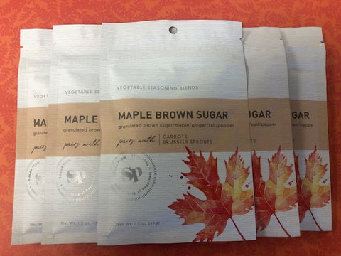 Five packs of Maple Brown Sugar Vegetable Seasoning with maple leaf design, perfect for enhancing roasted carrots and Brussels sprouts.