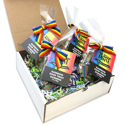 Rainbow Sour Twist Gummies in colorful 7 oz bags with ribbon, perfect for sweet and sour snacking and sharing, displayed in a box.