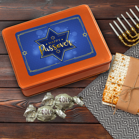 Kosher for Passover Pareve Dairy-Free Truffles with festive gift tin, matzah, and menorah on a wooden table.