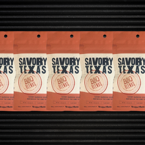 Five-pack of Savory Texas BBQ Seasoning featuring bold BBQ spice blend packaging on a textured background.