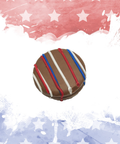 Patriotic chocolate with red, white, and blue drizzle on American flag background, perfect for celebrating Independence Day or Veterans Day.