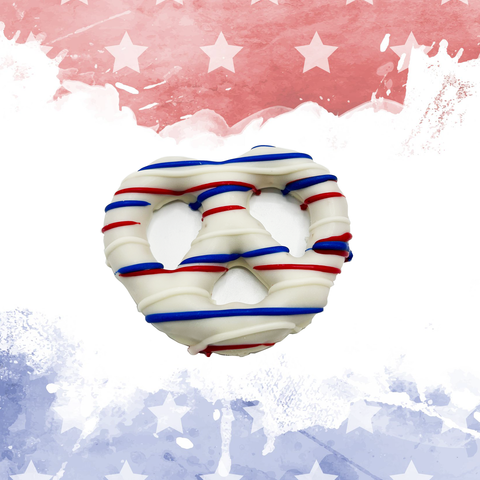 Patriotic chocolate-covered pretzel with red, white, and blue drizzle on a festive starry background.