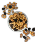Whiskey Old-Fashioned flavored nuts in a bowl with scattered nuts on a black background.