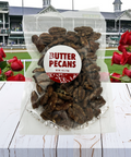 Butter Pecans 4 Oz bag with Kentucky Derby racetrack and red roses background, part of Sugar Plum's Derby Chocolate & Nuts Box.