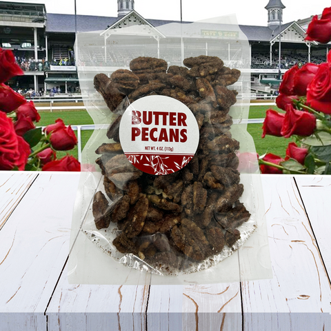 Butter Pecans 4 Oz bag with Kentucky Derby racetrack and red roses background, part of Sugar Plum's Derby Chocolate & Nuts Box.