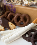 Gourmet chocolate pretzels and snacks assortment from Sugar Plum's Double Decadence gift box, perfect for holidays and special occasions.