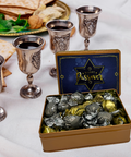 Kosher for Passover Pareve dairy-free truffles in a gift box with Passover Seder setting and wine cups.
