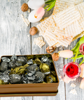 Kosher for Passover pareve dairy-free truffles in gift box with matzo and wine, perfect for holiday celebrations.
