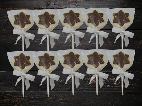 Set of 10 handcrafted milk and white chocolate snowflake lollipops with white bows, festive holiday treats perfect for Christmas gifting.